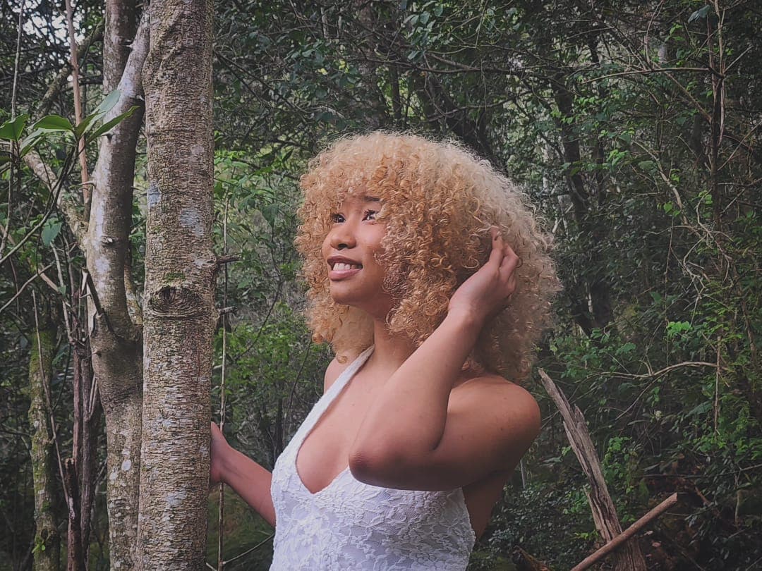 A portrait of me in the woods, looking off-camera